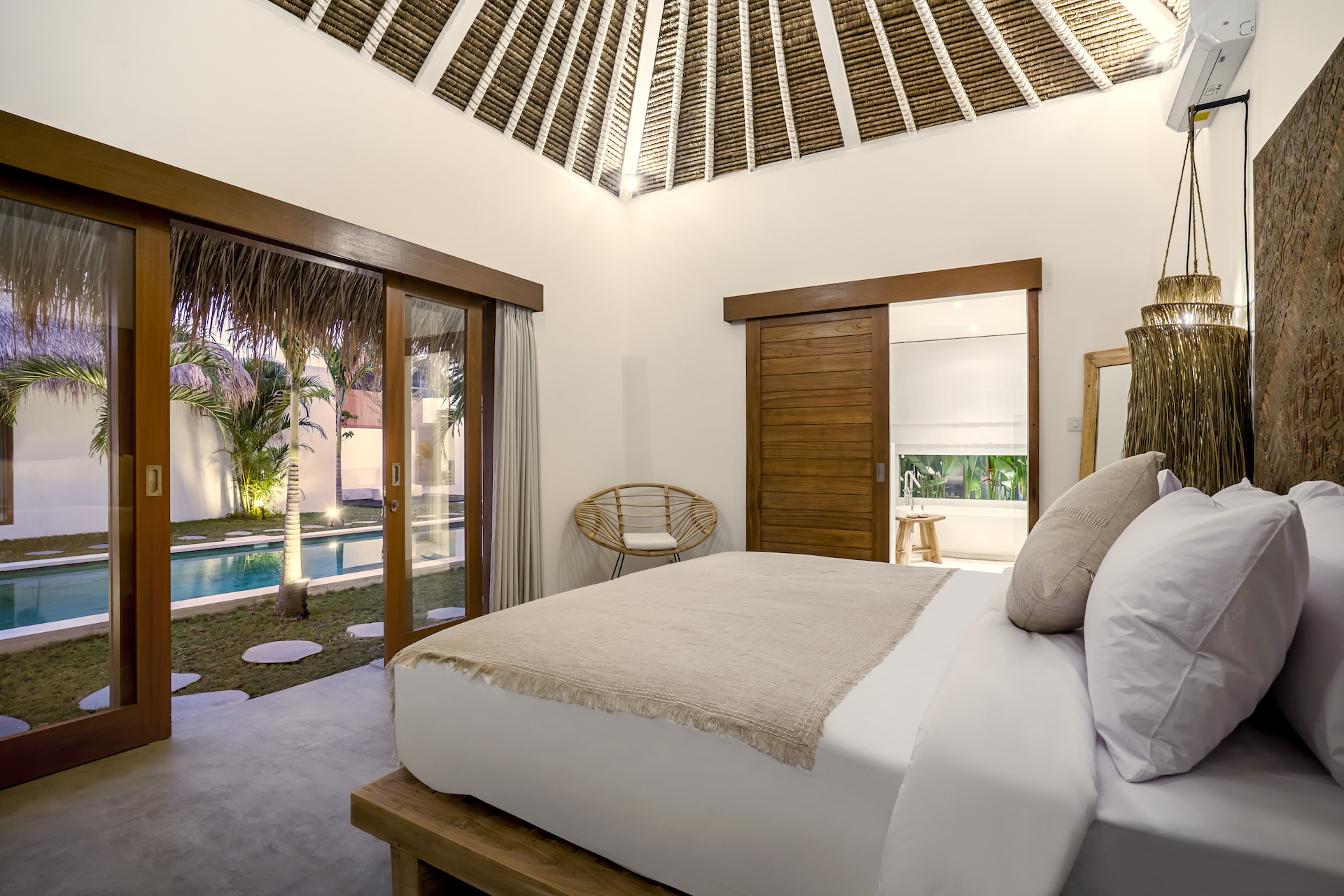 The bedroom pool view at Cocotier Seminyak villa only walking distance to Seminyak beach Bali